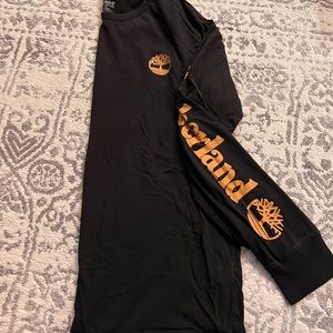 Timberland Mens Black Long-Sleeve with Timberland Logo and Decal on Sleeve